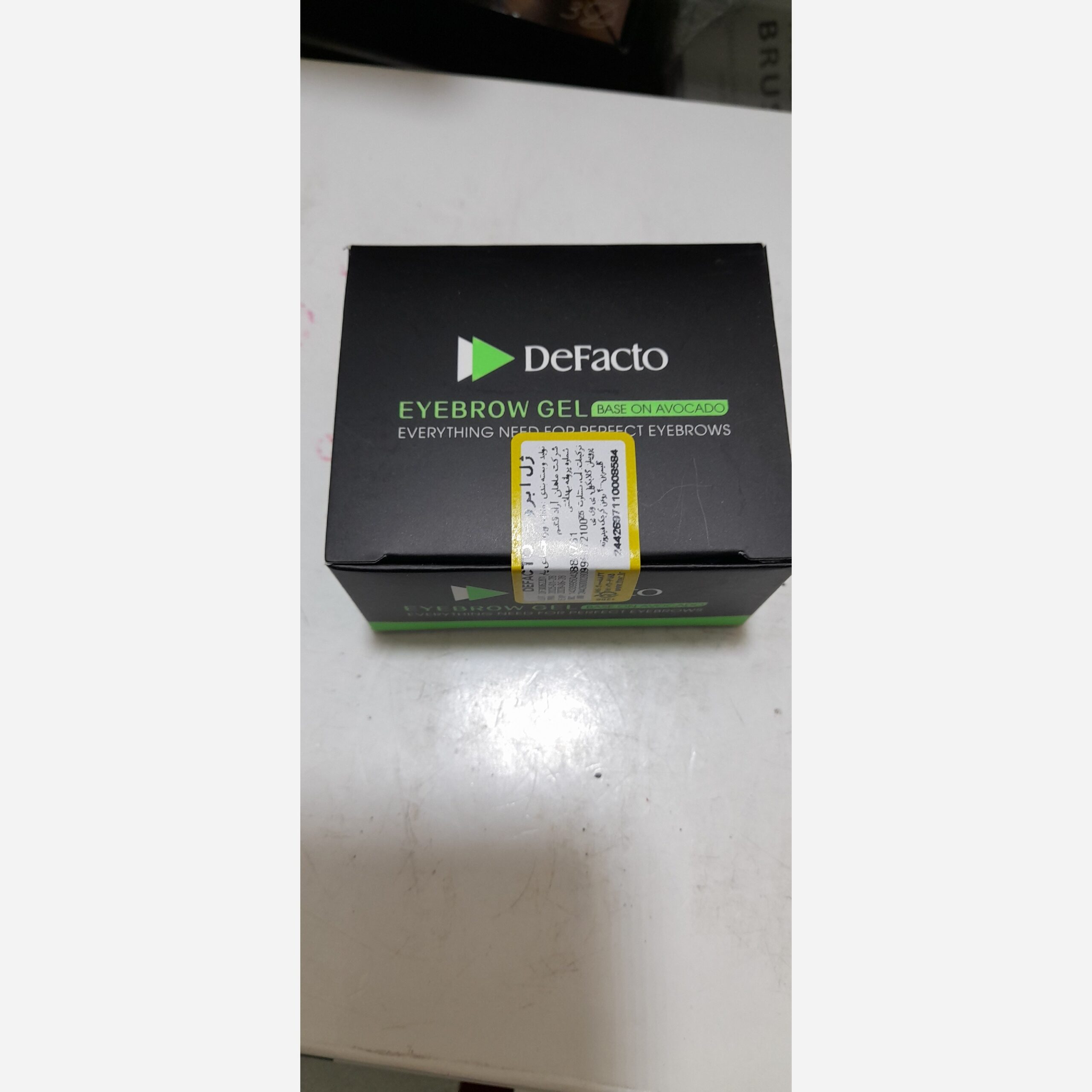 ژل ابرو کاسهای دفکتو با پایه آووکادو در بستهبندی مشکی و سبز